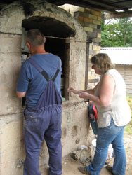 Tim and Tina packing the soda kiln